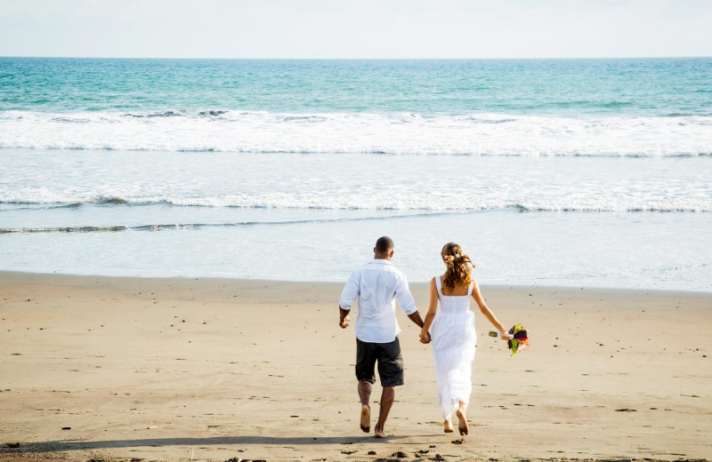 Couple on beach at Croc's Resort & Casino.