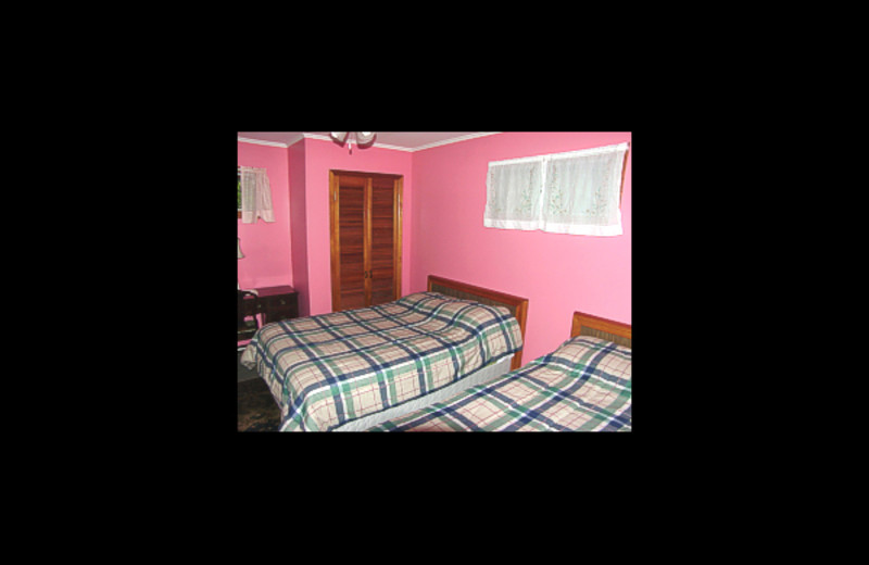 Cabin bedroom at Cool Ledge Family Resort.