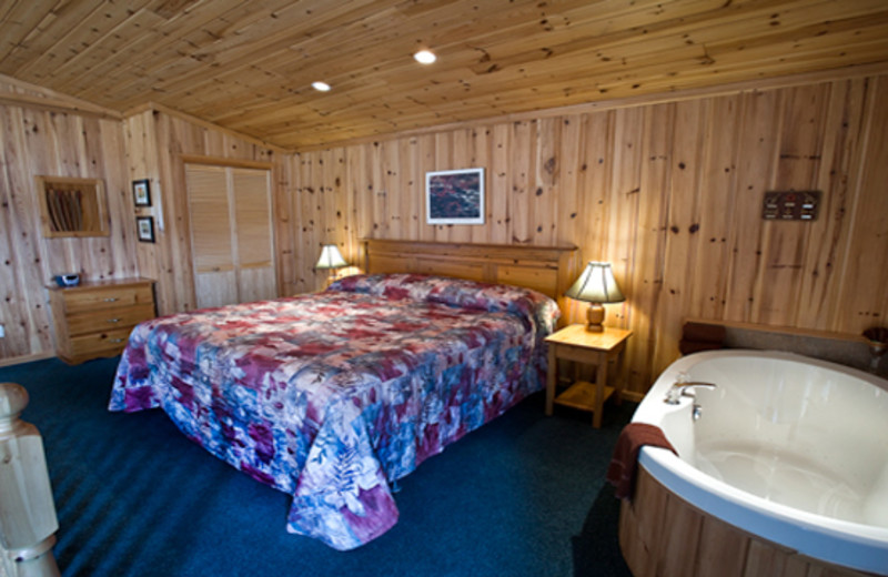 Cabin bedroom at Blue Spruce Resort.