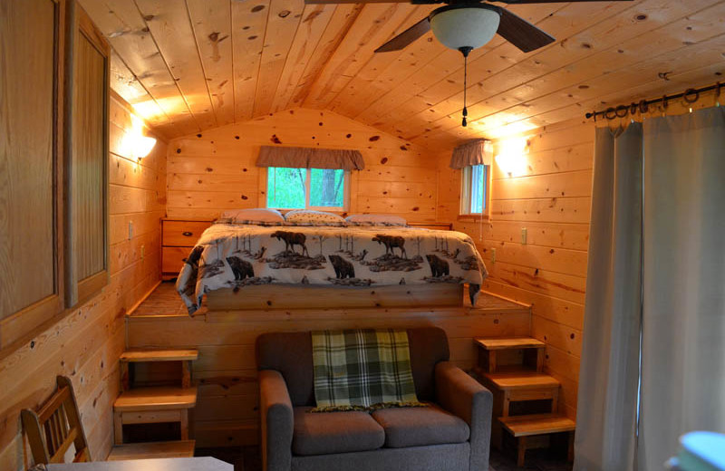 Cabin bedroom at Backroads Inn and Cabins.