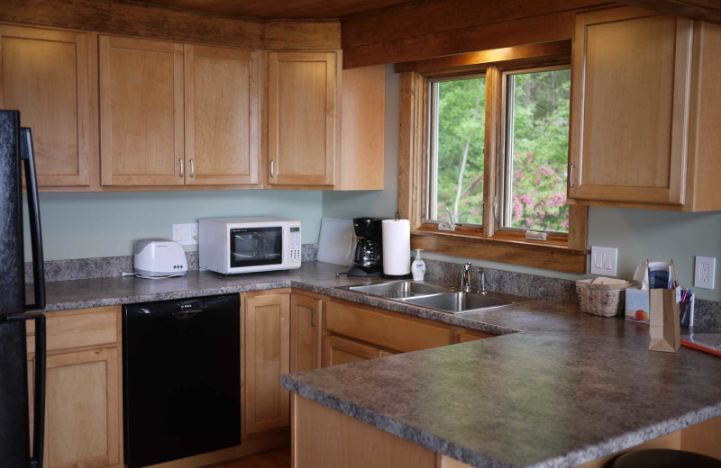 Rental kitchen at Acadia Cottage Rentals.