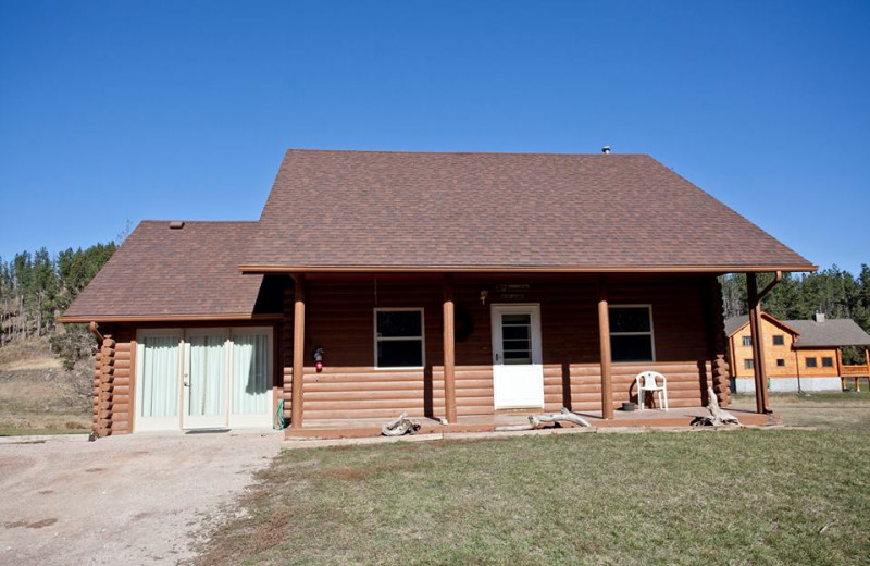 Cabin exterior at High Country Guest Ranch.