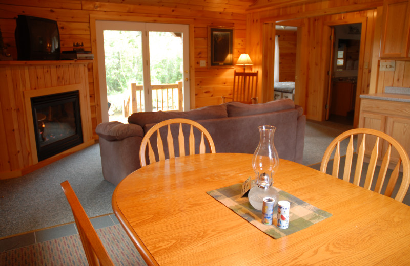 Cabin living and dining room at Cabins at Lopstick.