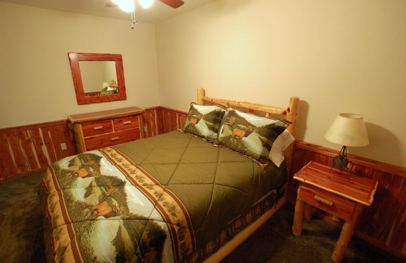 Cabin bed at Lake Forest Luxury Log Cabins.