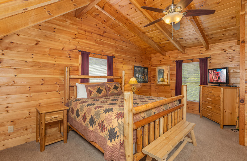 Bedroom at American Patriot Getaways - Smokies Paradise Lodge.