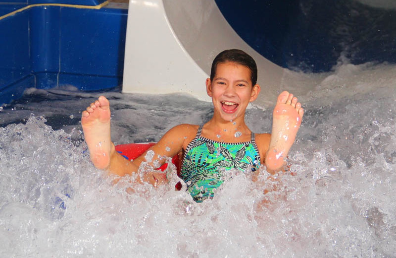 Kid going down water slide at Bavarian Inn of Frankenmuth.