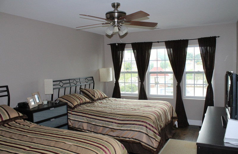 Vacation rental bedroom at Beach Combers Vacation Rentals.