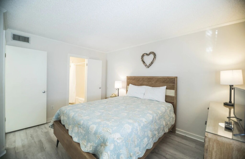 Rental bedroom at North Beach Vacation Rentals.