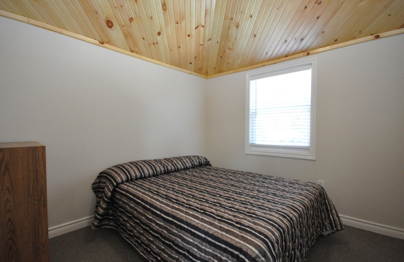 Cottage bedroom at Hall's Cottages.