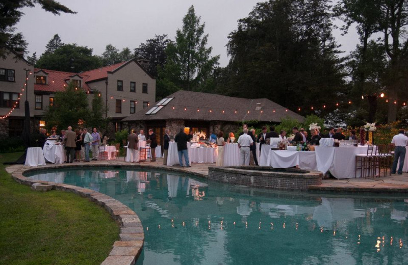 Wedding by the pool at Rock Hall Luxe Lodging.