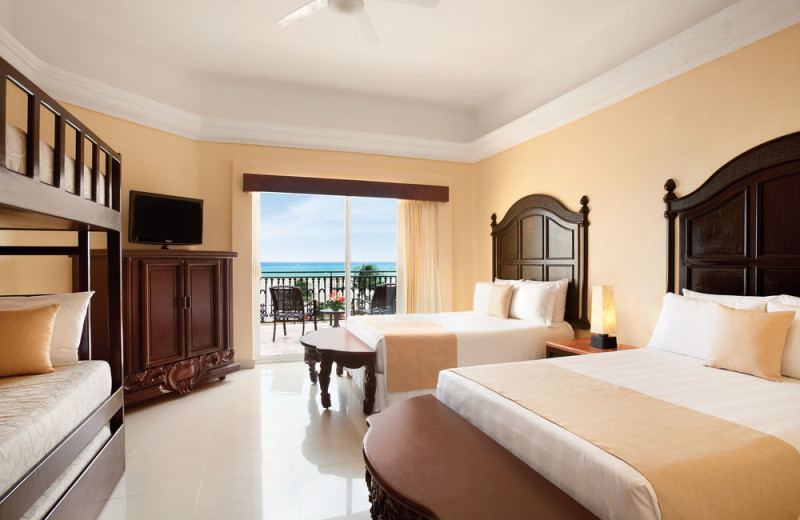 Guest room at Gran Porto Real Resort and Spa Playacar.