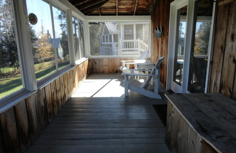 Cabin porch at Hunter Cove on Rangley Lake.