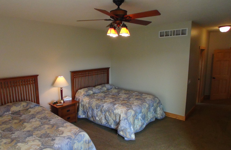 Cottage bedroom at A-Ga-Ming Golf Resort.