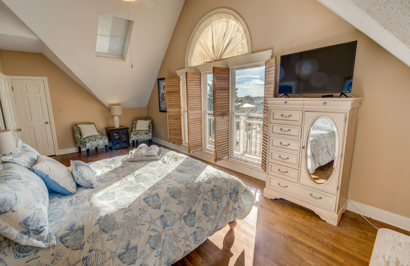 Rental bedroom at Sandbridge Blue Vacation Rentals.