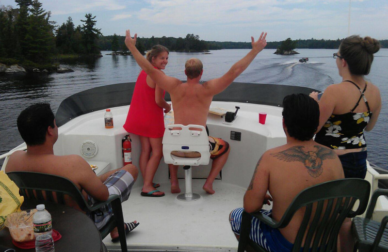 Driving the houseboat at Ebel's Voyageur Houseboats.