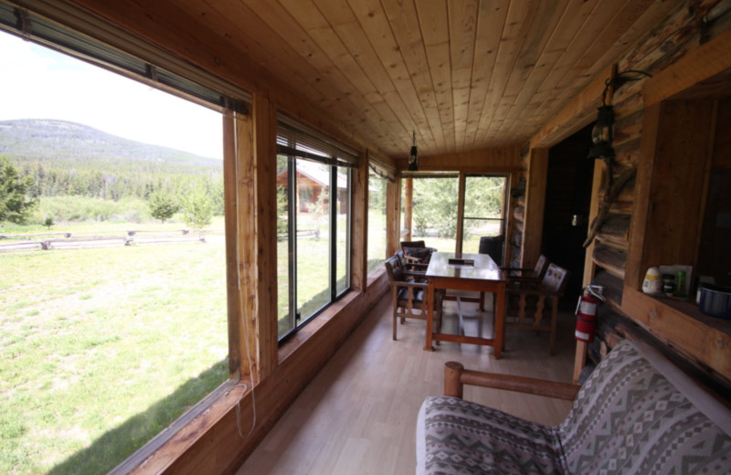 Cabin porch at Chaunigan Lake Lodge.