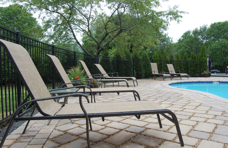 Pool chairs at Sea Rose Suites.