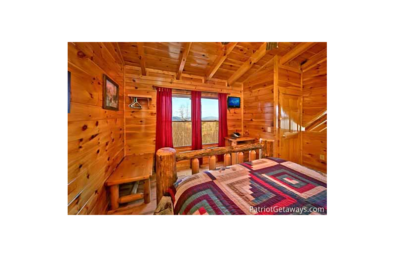 Bedroom at American Patriot Getaways - A Tree Top Lodge.