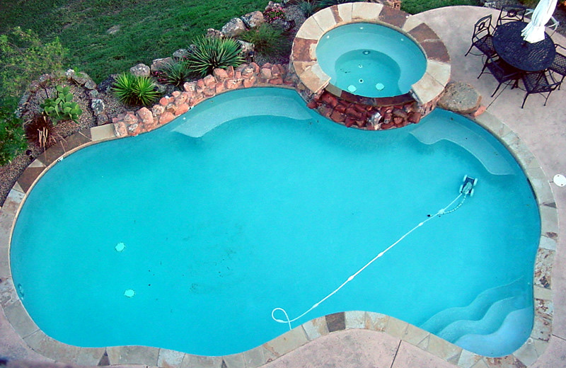 Outdoor pool at Greystone Castle Sporting Club.