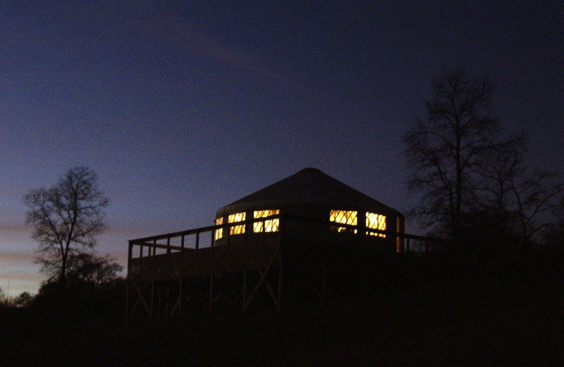 Night time view of yurt at Stone Wind Retreat.