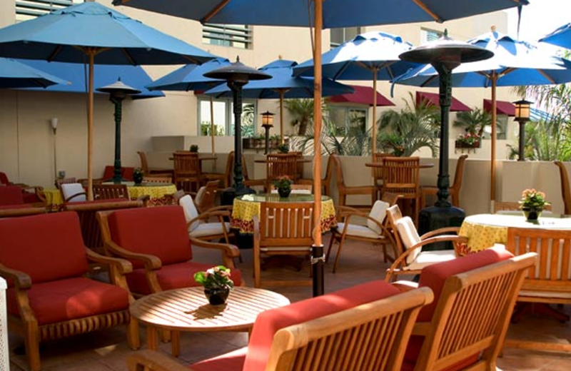 Patio view at Le Merigot Beach Hotel & Spa.