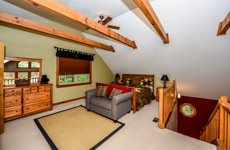 Cabin bedroom at Dogwood Cabins LLC.