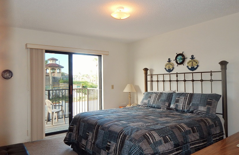 Rental bedroom at Family Sun Vacation Rentals.