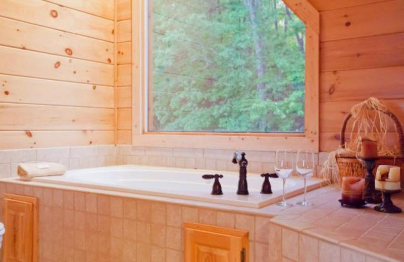 Cabin hot tub at Mountain Getaway Cabin Rentals.