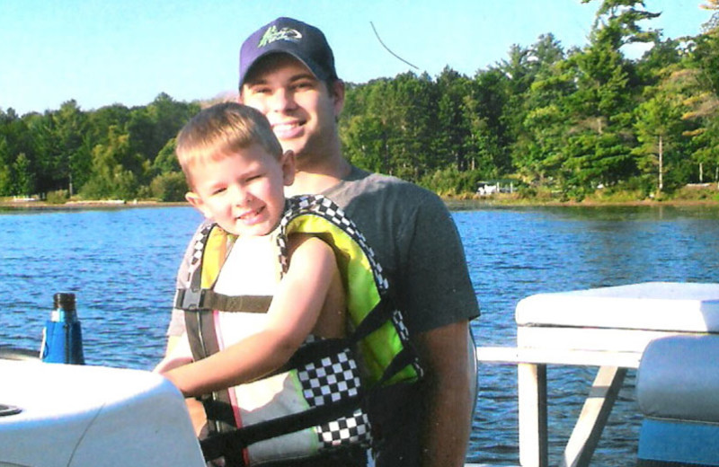 Family boating at Golden Rule Resort.