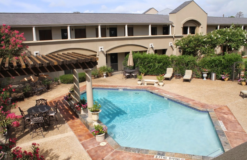 Outdoor pool at Vineyard Court Designer Suites Hotel.