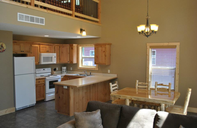 Cabin kitchen and dining area at Blue Water Lodge.