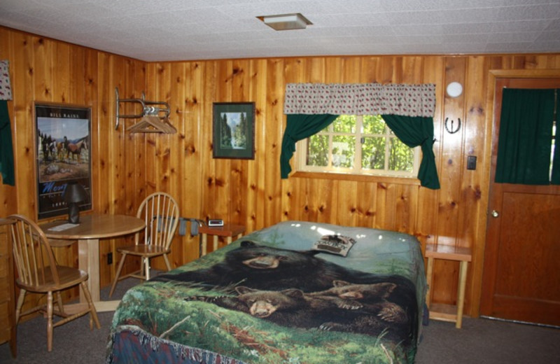 Cabin bedroom at Absaroka Mountain Lodge.