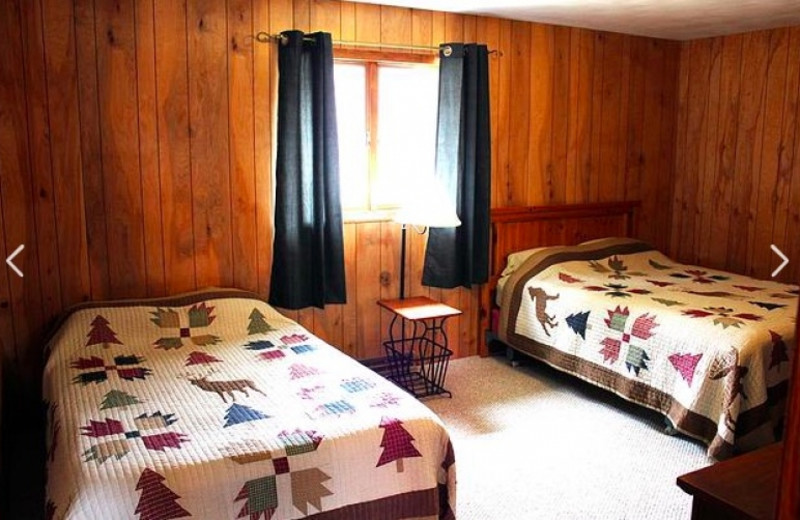 Cabin bedroom at Nitschke's Northern Resort.