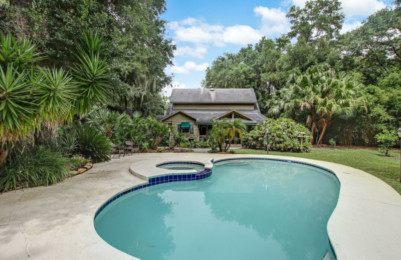 Rental outdoor pool at Amelia Rentals and Management Services.