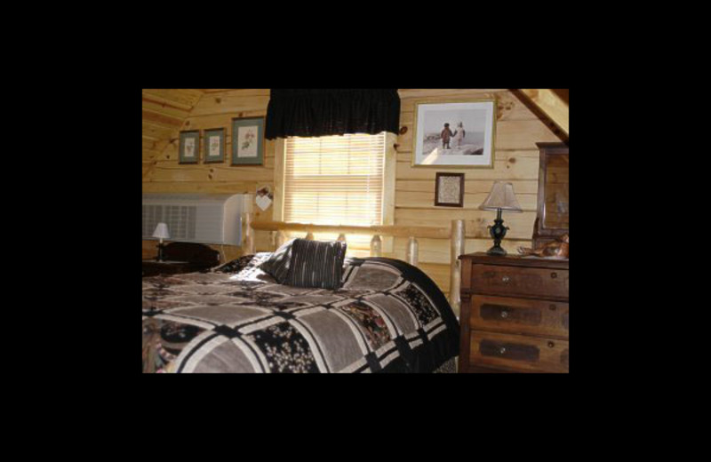 Cabin bedroom at Honey Fork Properties.