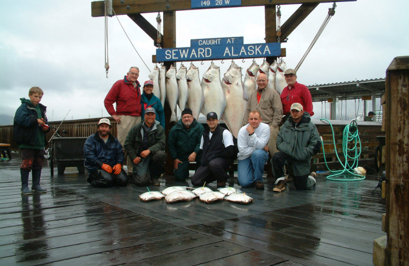 Fishing by the sea at Kenai Riverside Lodge.