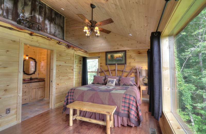 Cabin bedroom at Oak Haven Resort.