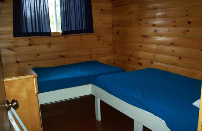 Cabin bedroom at Silv'ry Moon Lodge.