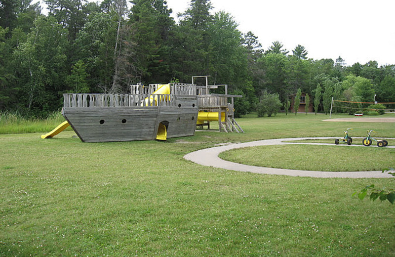 Little Norway features a large playground setting for family's to enjoy. Swings, slides, ships, basketball, volleyball are some of what you can enjoy at Little Norway Resort.