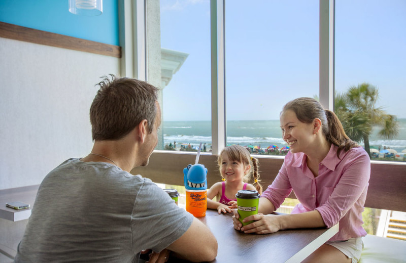 Family dining at Crown Reef Resort.