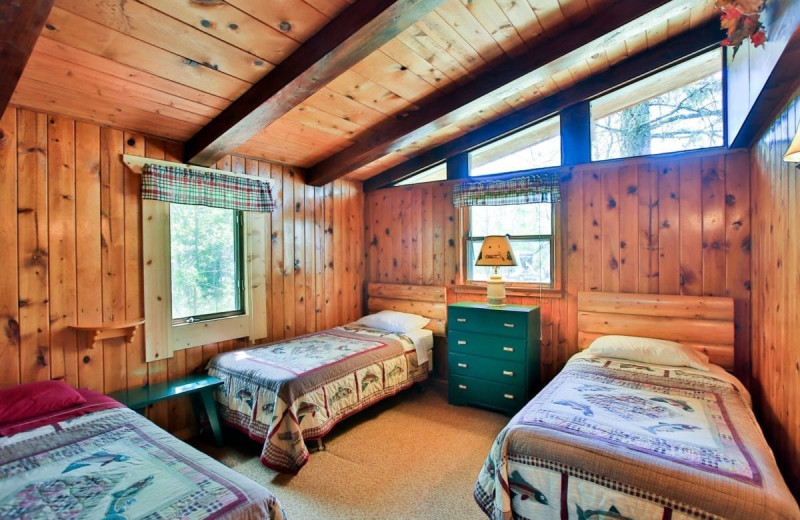 Cabin bedroom at Northern Lights Resort & Outfitting.