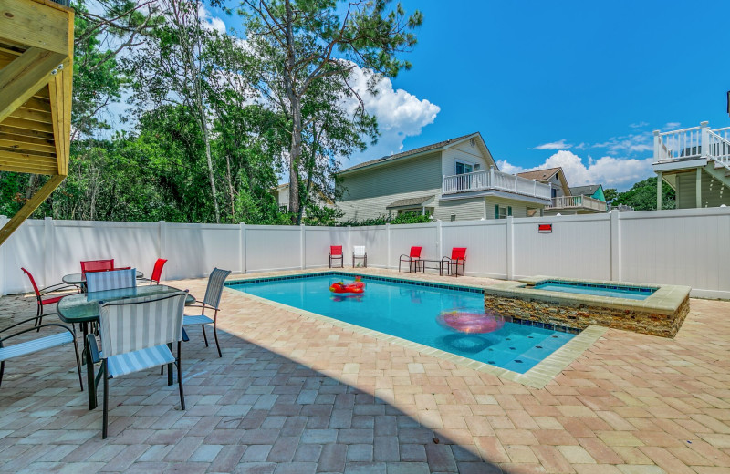 Guest outdoor pool at Together Resorts.