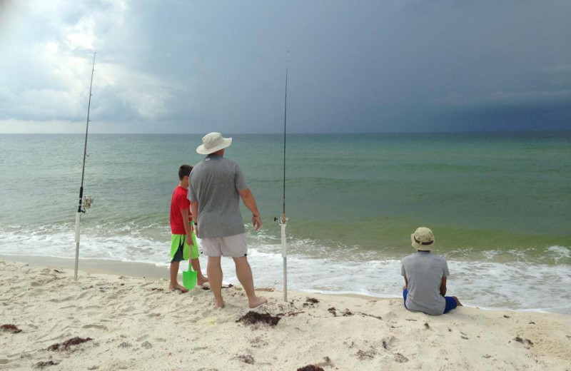 Fishing on the beach at Perdido Key Resort Management.