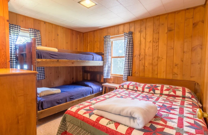 Cottage bedroom at Fisher's Lakeside Cottages.