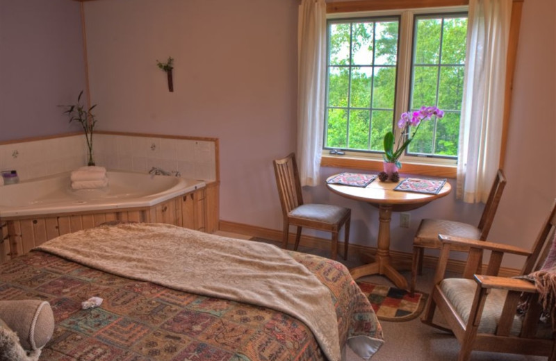 Cabin bedroom at Poplar Creek  B & B.