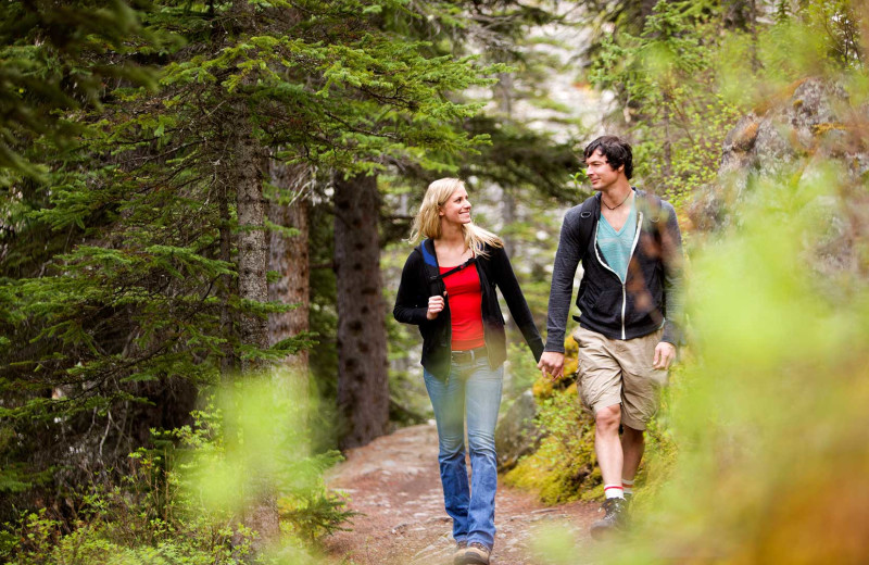 Couple taking at hike at Stony Brook Cabins LLC.