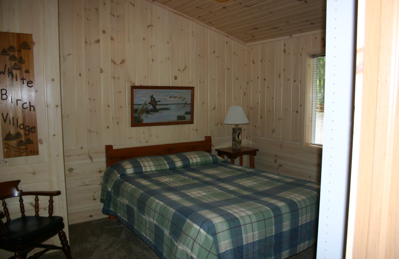 Cabin bedroom at White Birch Village Resort.