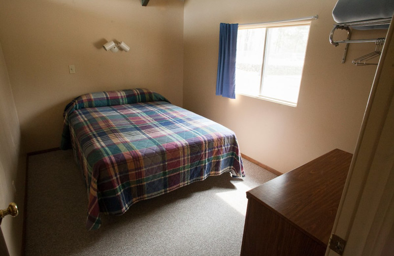 Cabin bedroom at Indian Trails Resort.