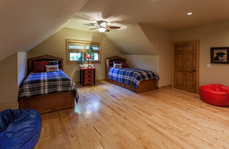Cabin bedroom at Mountain Oasis Cabin Rentals.