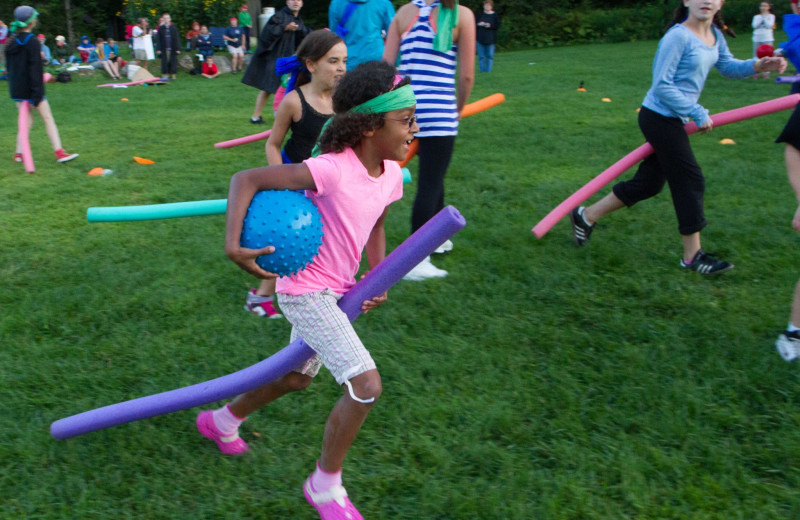 Quidditch is a favorite activity for kids and adults alike at Common Ground Center's family camp programs.